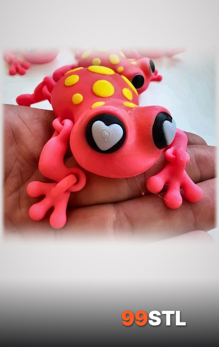 Articulated frog STL 3D printed in pink with yellow spots and heart eyes in a hand